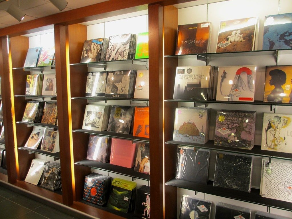Wall of vinyl releases at Sub Pop Airport Store.