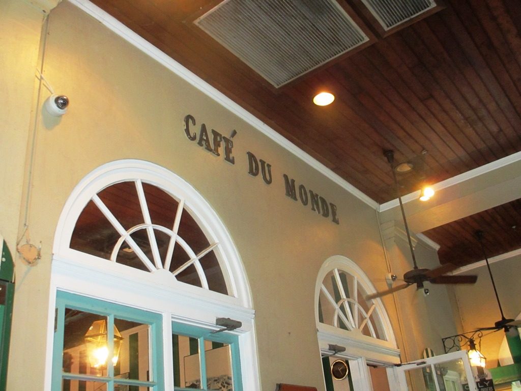 Café du Monde sign from seating area. Located in the French Quarter in New Orleans, Louisiana.