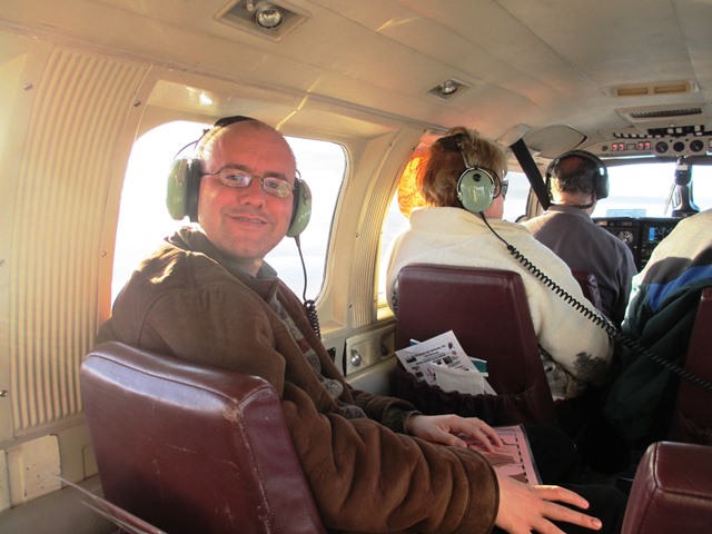 Erik Tomren inside Piper Navajo Chieftain plane.